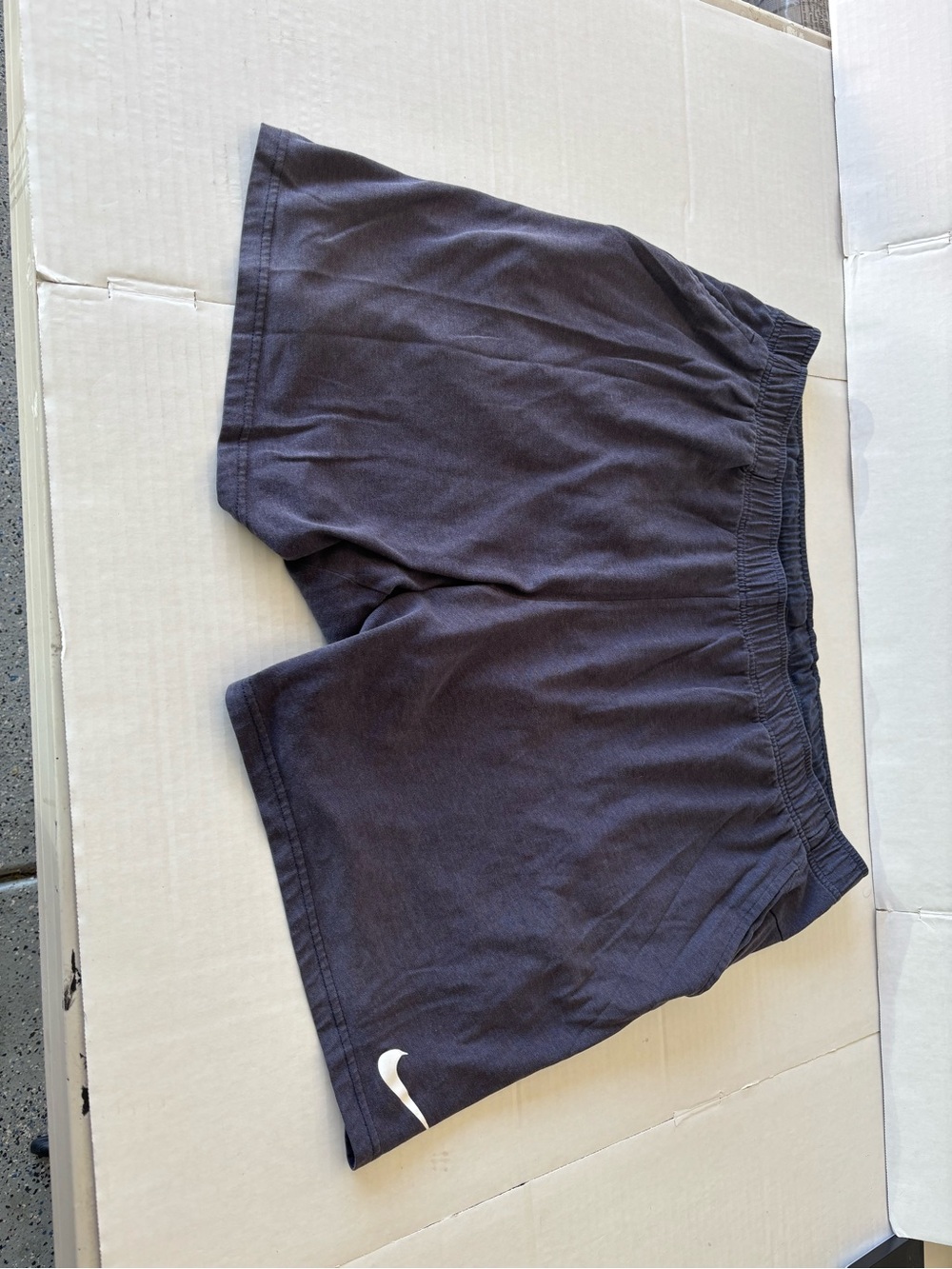 Nike Men's Dark Black Athletic Shorts with White Swoosh